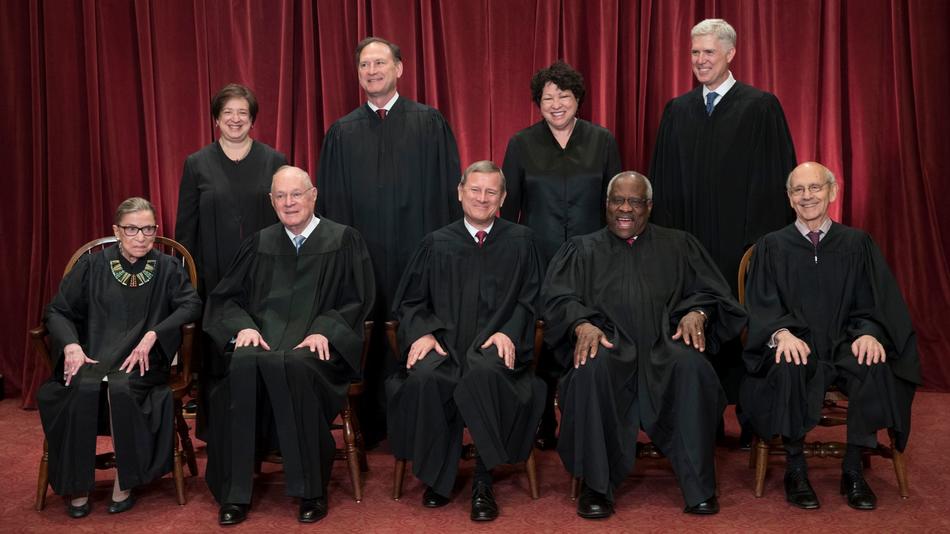 The justices of the U.S. Supreme Court at the Supreme Court Building in Washington on June 1. (J. Scott Applewhite / Associated Press)