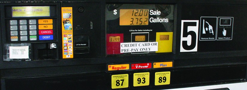 A gas pump that sold 3.752 gallons of gas for 12 dollars.