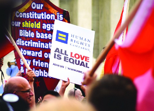 An image of a sign reading Human Rights Campaign All love is equal