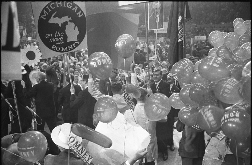 A photo of the Republican national convention in 1964. People hold signs and balloons in support of George Romney.