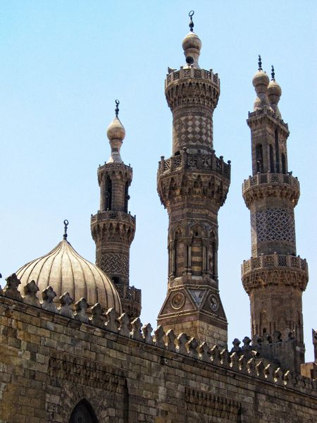 These minarets are more intricate than those examined previously on this page. There are three in this photograph, and each varies from the others in its design and shape. Each design relies heavily on geometric patterns for its artistry.