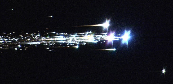 Image of the Hayabusa Reentry into Earth’s Atmosphere. The main spacecraft broke-up and burned in the upper atmosphere, generating a multitude of bright streaks in the sky.
