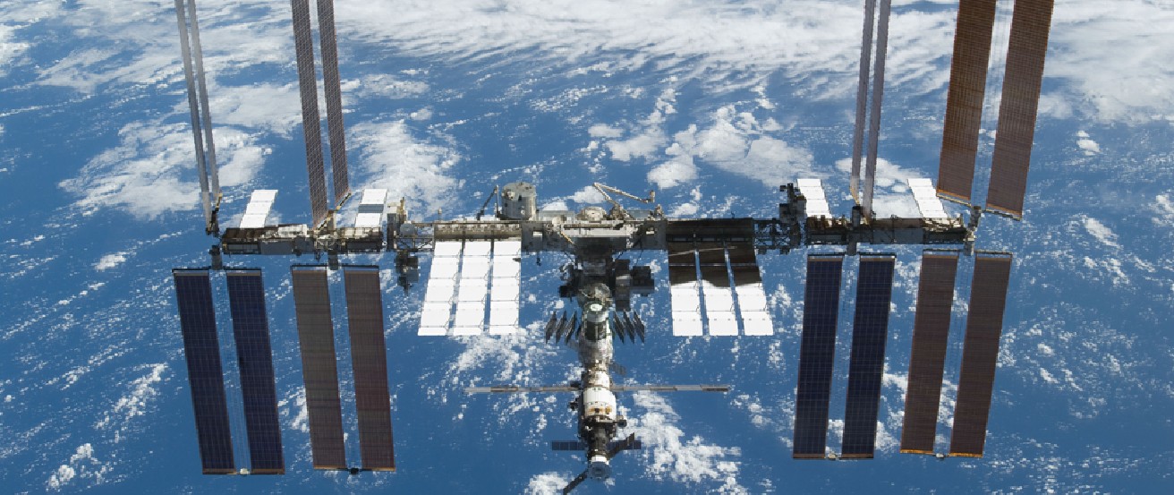 Photograph of the International Space Station in orbit around the Earth.