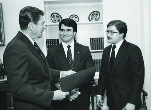 An image of Jack Abramoff standing between Ronald Reagan and Grover Norquist.