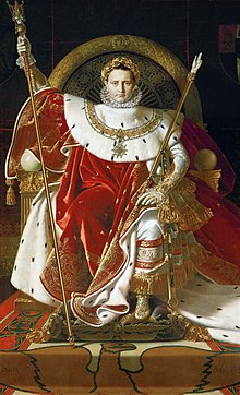 A portrait of Napoleon. He is wearing a red and white robe and sitting on his throne.