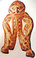A biscuit in the shape of a gingerbread man.
