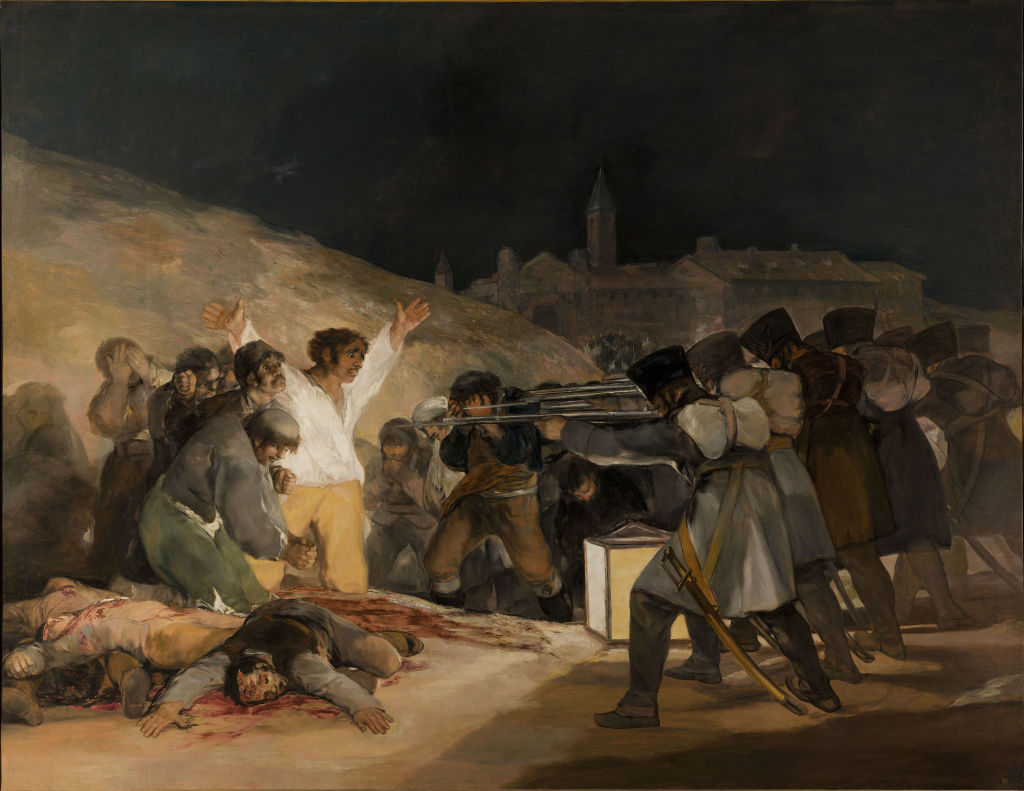 A group of terrified civilians face a firing squad of soldiers; several bloody dead comrades lie at the civilians' feet.