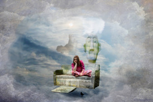 Surrealistic photo of a woman sitting on a sofa, head in her hand. The sofa floats in a cloud-like atmosphere, and images of an Easter Island style statue and a bird surround her.