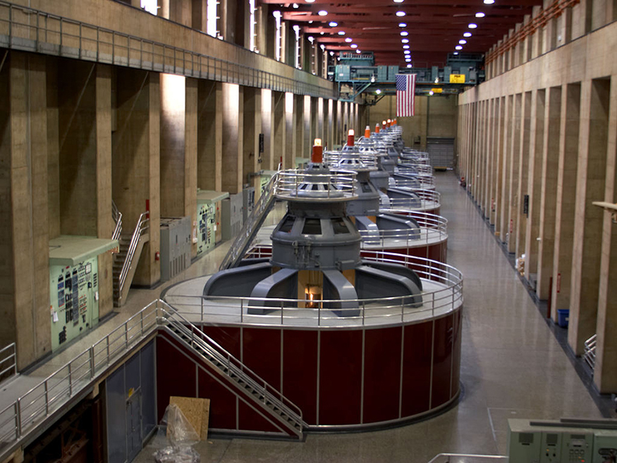 Photo of large circular generators inside a large hallway.
