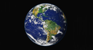 A photo depicts Earth from space.