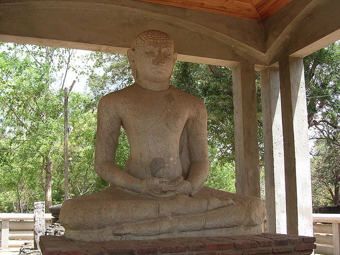 This is a current-day photo of the Samadhi Statue, located in Anuradhapura.