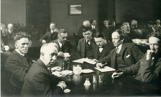 This photo shows six of the Group of Seven, plus their friend Barker Fairley, in 1920. From left to right: Frederick Varley, A. Y. Jackson, Lawren Harris, Fairley, Frank Johnston, Arthur Lismer, and J. E. H. MacDonald. The Group of Seven aimed to develop the first distinctly Canadian style of painting.