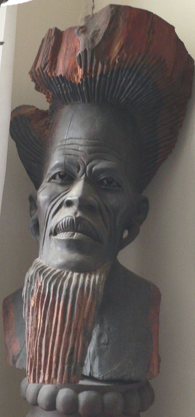 Sculpture of a man with a long beard.