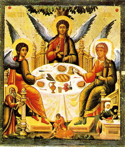 This photo shows a Russian icon depicting the Holy Trinity. It shows the three figures of the Holy Trinity gathered around a table set with plates and food.