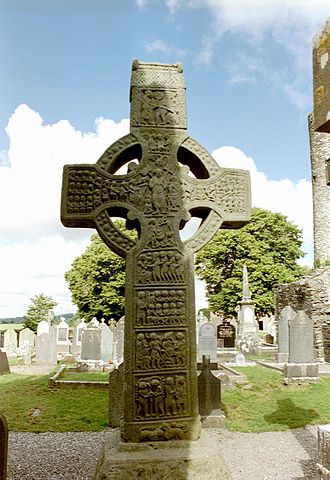This photo shows Muiredach's High Cross. Each of its 13 panels is decorated in with a relief that depicts a Biblical scene.