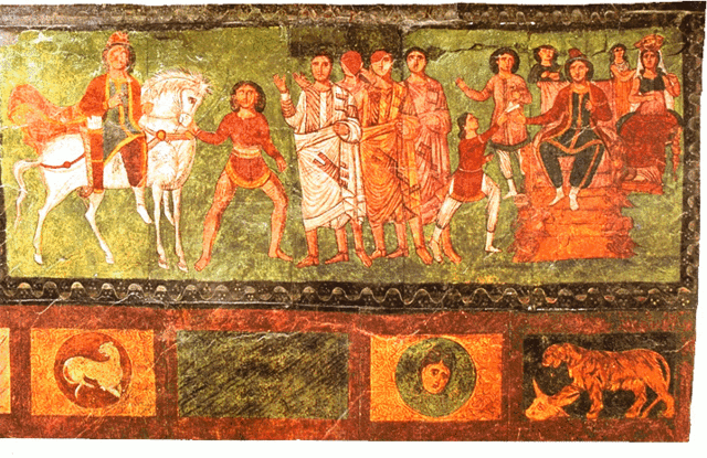 This is a photo of a fresco depicting a scene from the Book of Esther. It depicts Mordecai dressed in colorful robes as he is led about town on a white horse by Haman and the king's men.