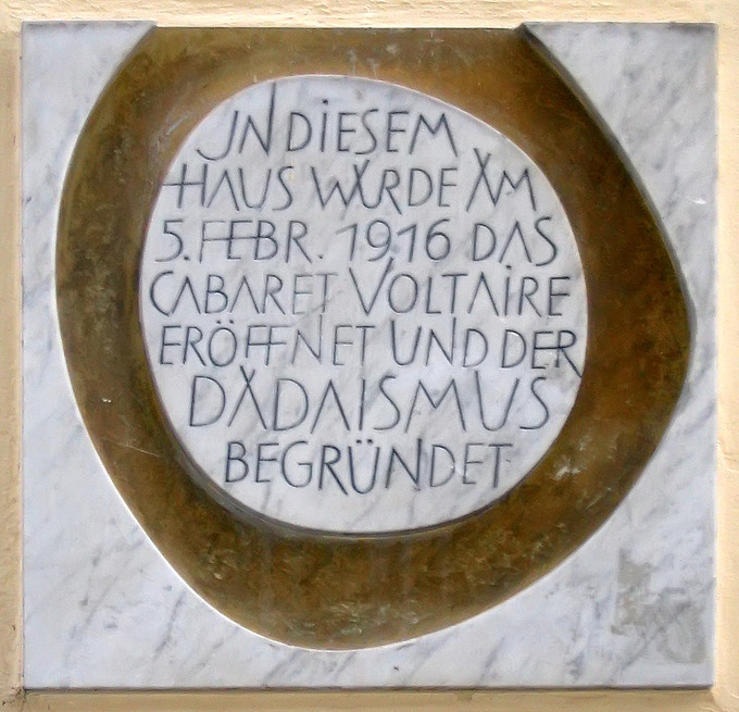 A circular plaque with German writing.