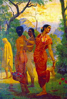 A woman, Shakuntala, dressed in bright red, pretends to remove a thorn from her foot, while actually looking over her shoulder for her husband. Two other women are smiling at each other.