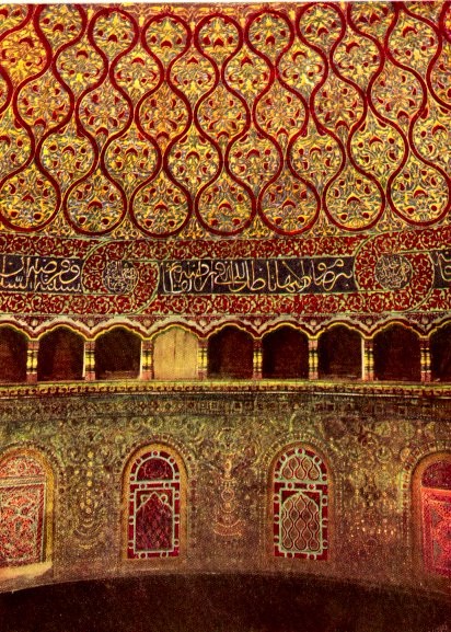 This photo shows the interior view of the Dome of the Rock. The interior of the dome is lavishly decorated in a red and gold color scheme with mosaic, faience and marble, much of which was added several centuries after its completion. It also contains Qur'anic inscriptions
