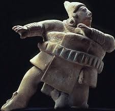 A figure of a large man leaning to the side with one leg out, as though in motion.