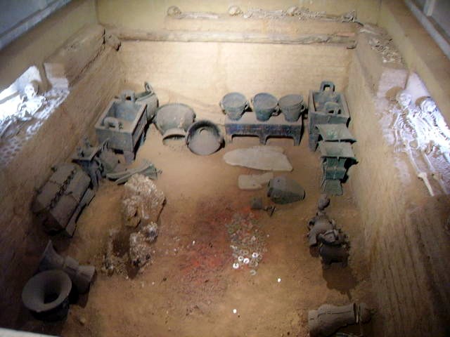 Photo of the tomb showing a variety of artifacts.