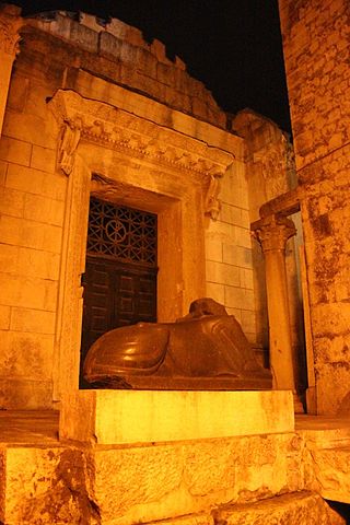 This is a photo of the headless sphinx in front of the Temple of Jupiter.