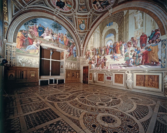 An image of the Stanze della Segnatura with an intricate floor in the foreground.