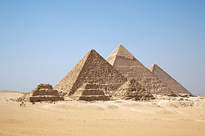 Photo depicts three pyramid structures.