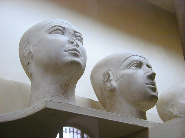 Bust depicts two human heads. They appear to be bald, signaling that they are commoners rather than pharaohs.