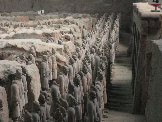 A photo of part of the tomb, showing three rows of terracotta figures.