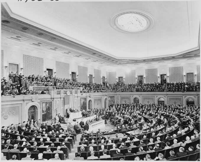 A picture of President Truman delivering his State of the Union to Congress in 1950.