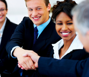A picture of two businessmen shaking hands as a form of networking.