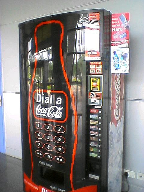 A Coca-Cola soda machine.