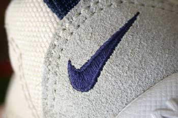 A Nike swoosh on a shoe.