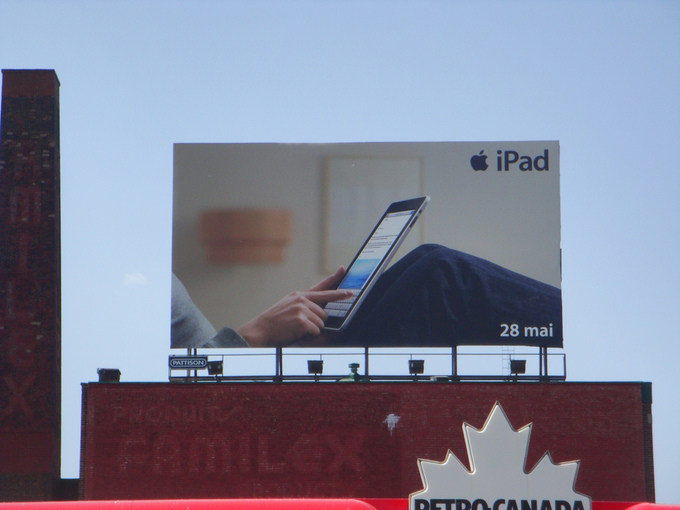 A billboard advertisement for Apple's iPad