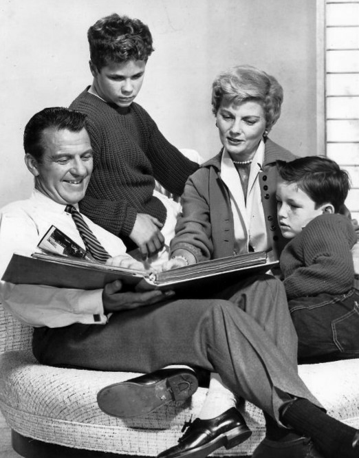 Photo of the Cleaver family from the television program Leave it to Beaver. The family is made up of a husband, wife, and two sons.