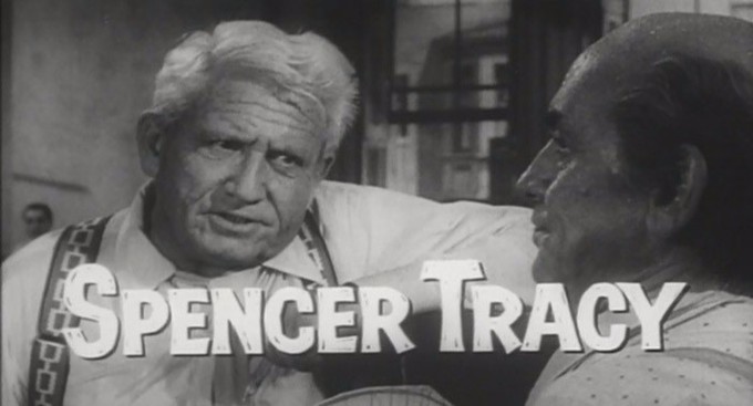 The image is a screenshot from a movie trailer for Inherit the Wind. It shows Spencer Tracy, who played lawyer Henry Drummond.