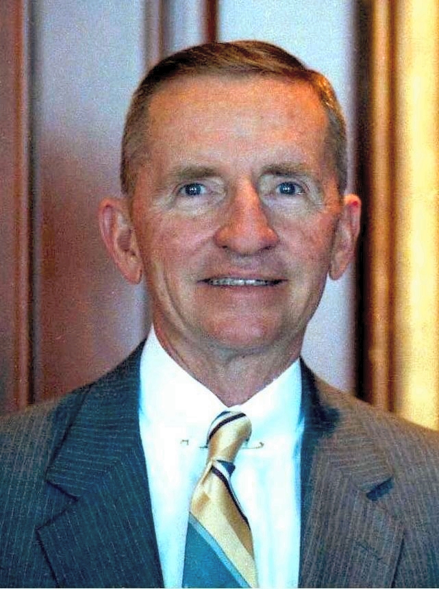 A color portrait of Ross Perot