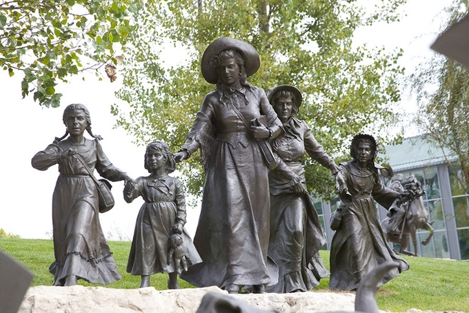 The includes statues of five women who range considerably in age.