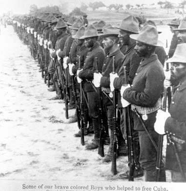 The photo shows a line up of hundreds of soldiers. The caption of the photograph says 
