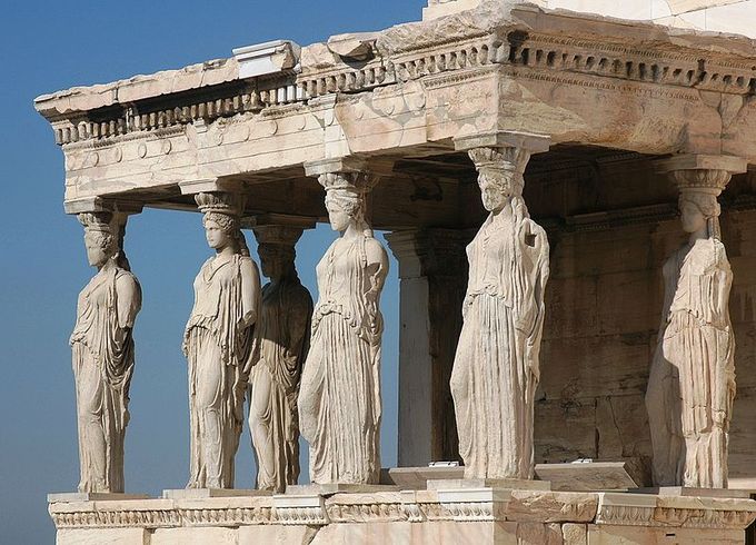 This image shows six caryatids. A caryatid is a sculpted female figure serving as an architectural support taking the place of a column or a pillar supporting an entablature on her head.