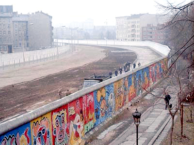 Image of the Berlin Wall covered in graffiti.