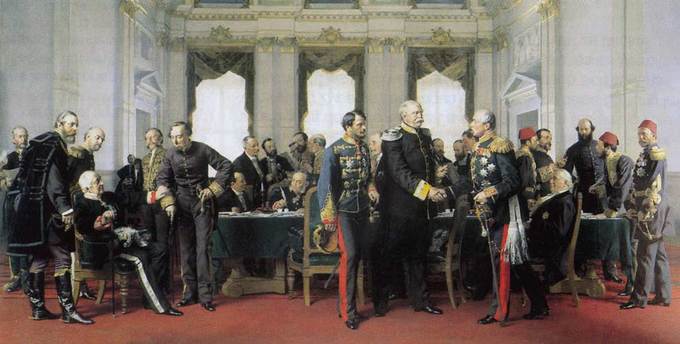 A painting of the Congress of Berlin, which depicts a few dozen men standing and sitting around a large table, some of them shaking hands.