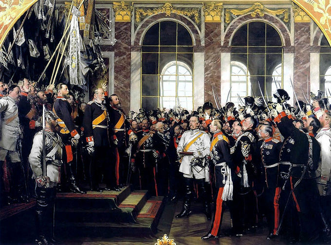 18 January 1871: The proclamation of the German Empire in the Hall of Mirrors at the Palace of Versailles. A large group of men, in formal military uniforms, gathered to proclaim the German Empire. Bismarck appears in white. The Grand Duke of Baden stands beside Wilhelm, leading the cheers. Crown Prince Friedrich, later Friedrich III, stands on his father's right. Painting by Anton von Werner.