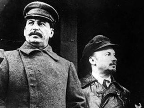 A photo of Joseph Stalin next to Nikolai Bukharin.