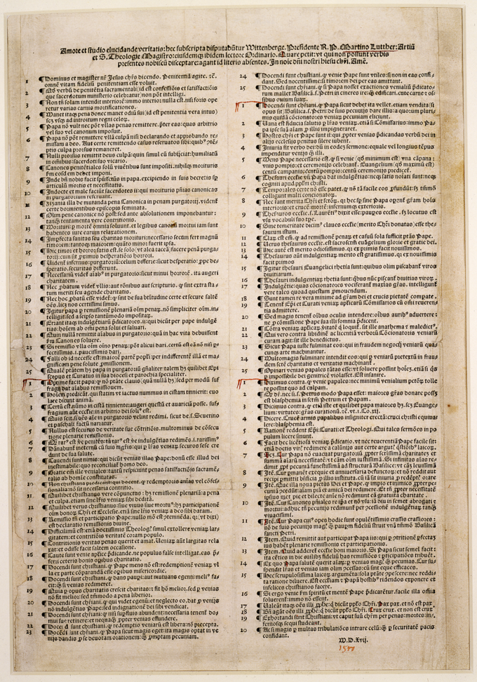A photo of a 1517 manuscript of the Luther's Ninety-five Thesis.