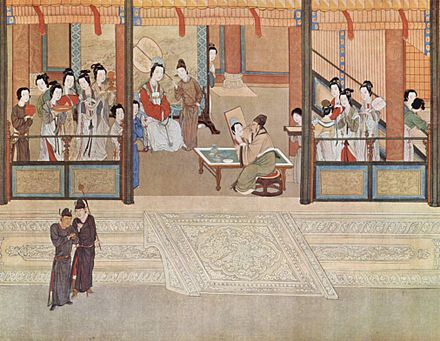 Painting of a Ming period palace, with women in luxurious clothing and makeup and a portrait painter.