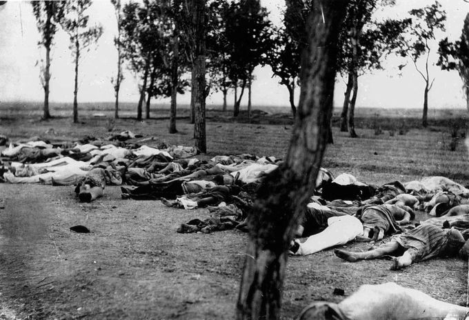 Photo of dead Armenians lying in a field in 1915 during mass deportations.