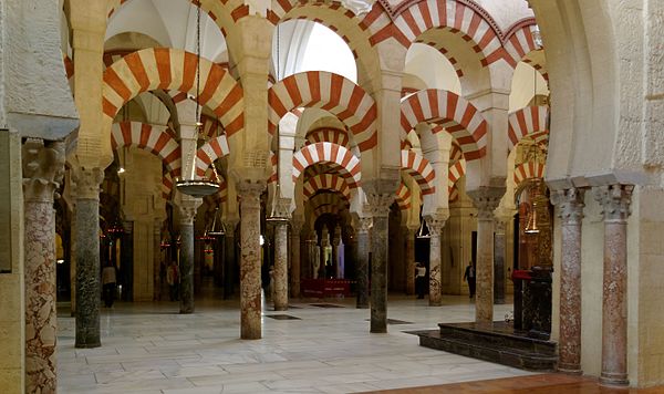 A photo of a Mosque in Spain built during the Caliphate of Cordoba. It is characterized by marble pillars and arches painted with red stripes.