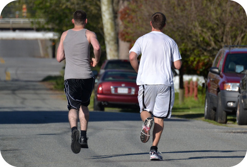Two boys running. Excessive sweating can lead to electrolyte loss that can be life-threatening